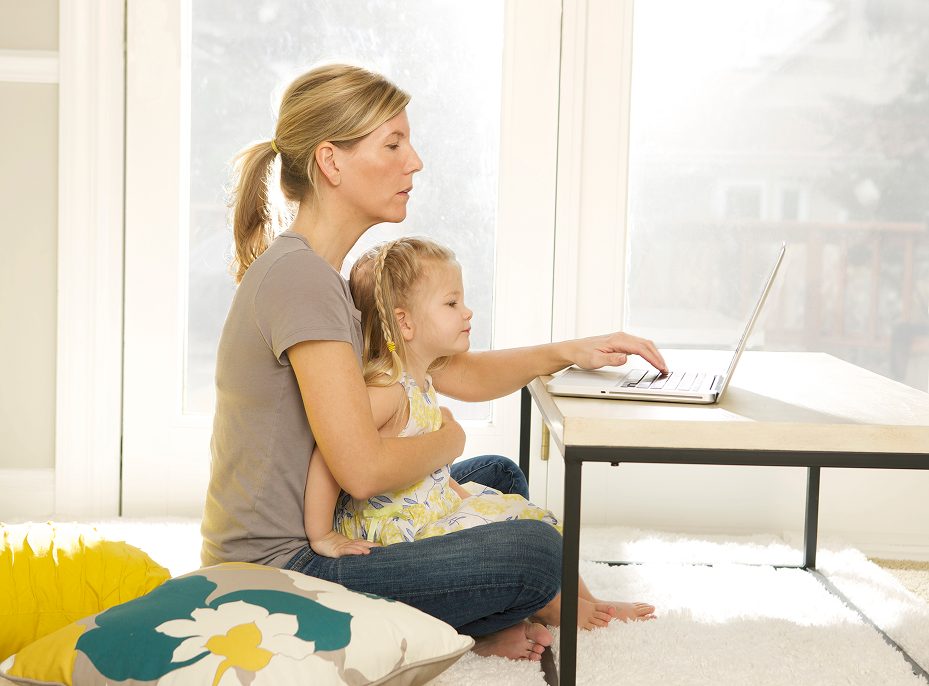 mother and child on laptop