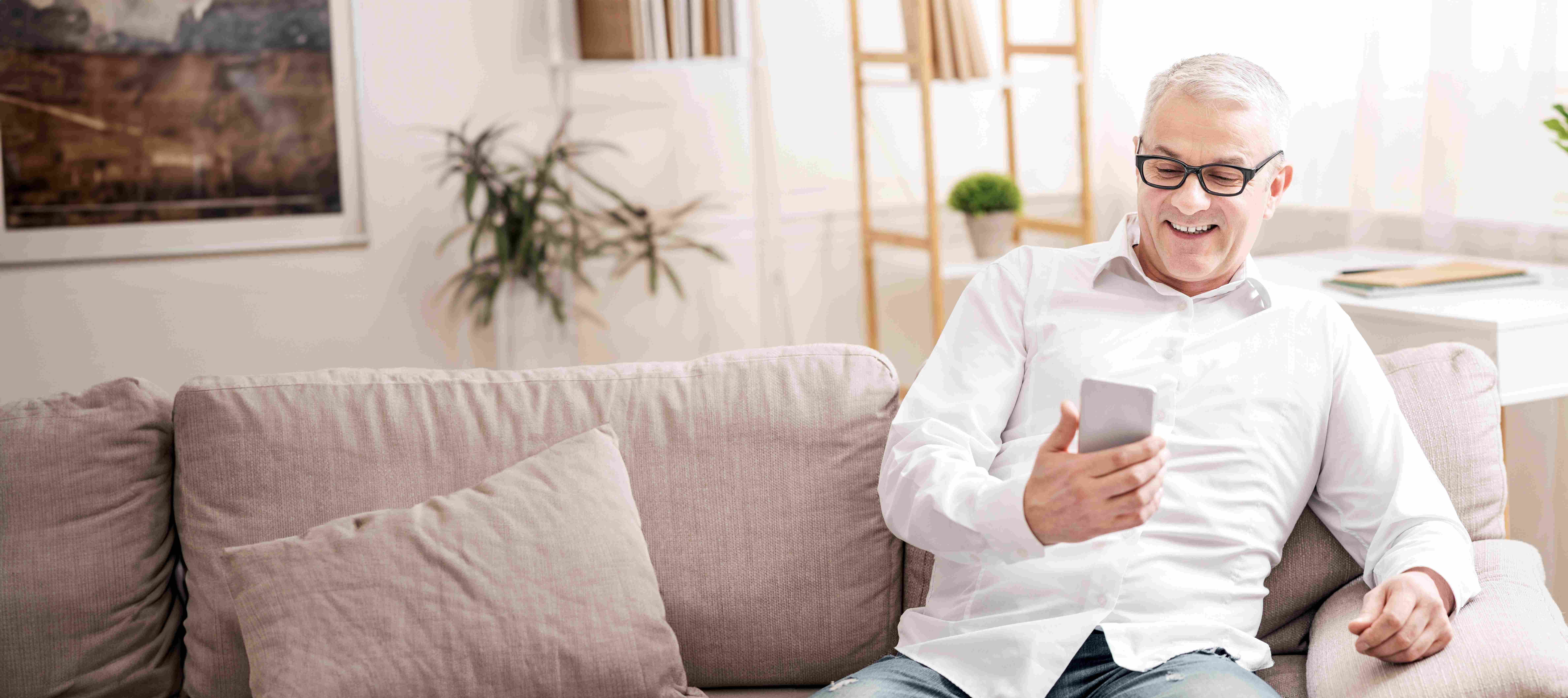 Man at home on the phone