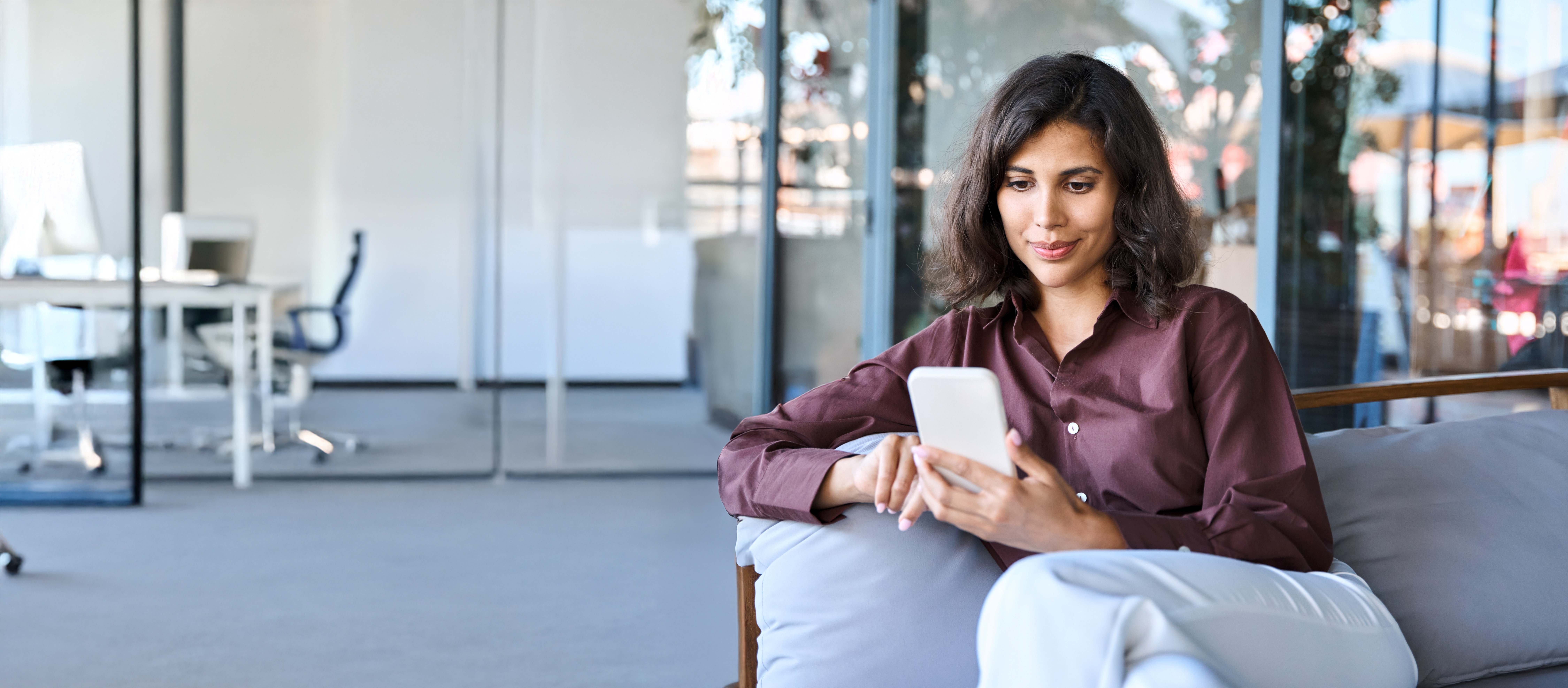 women at home on smart phone