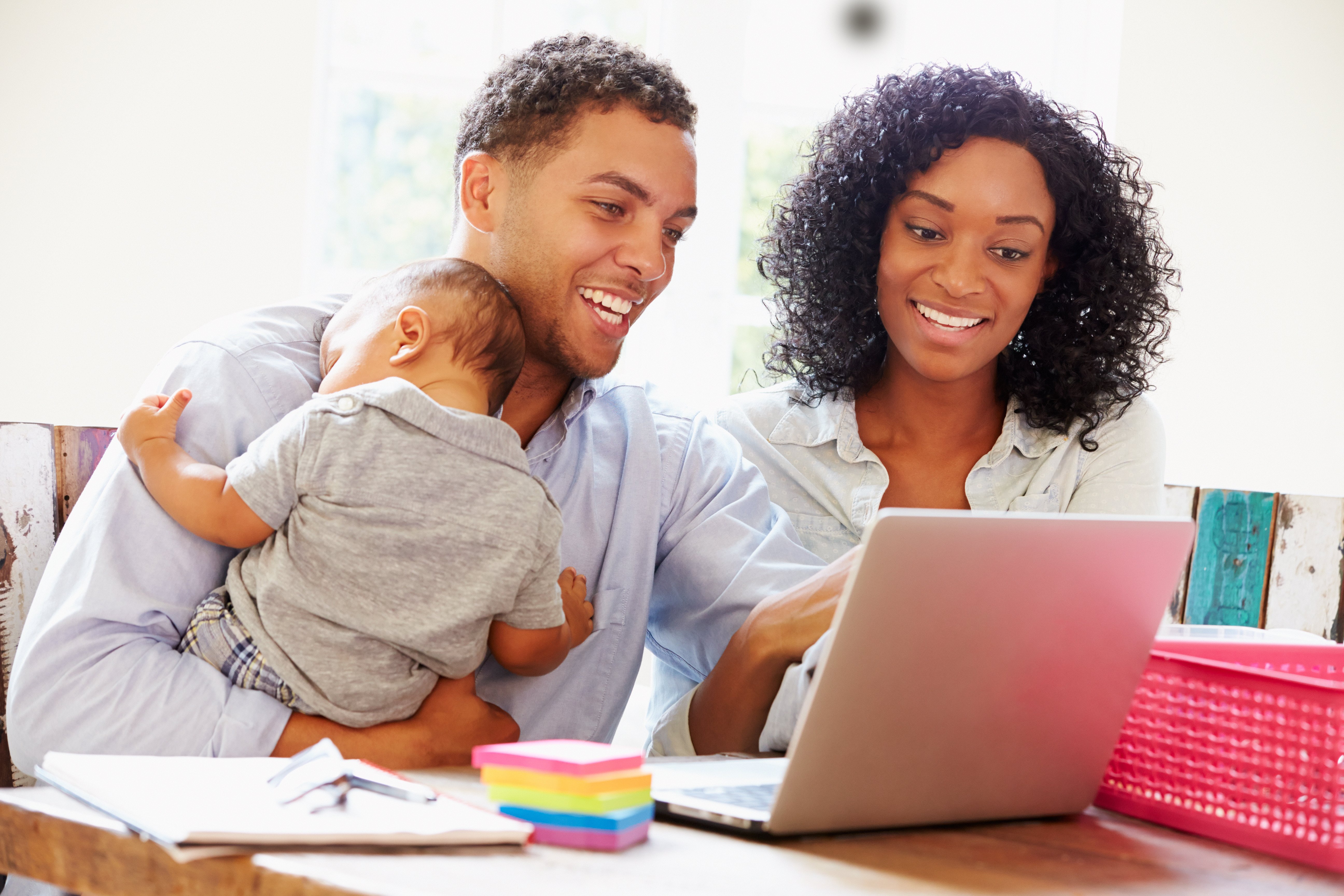 Family at home on laptop
