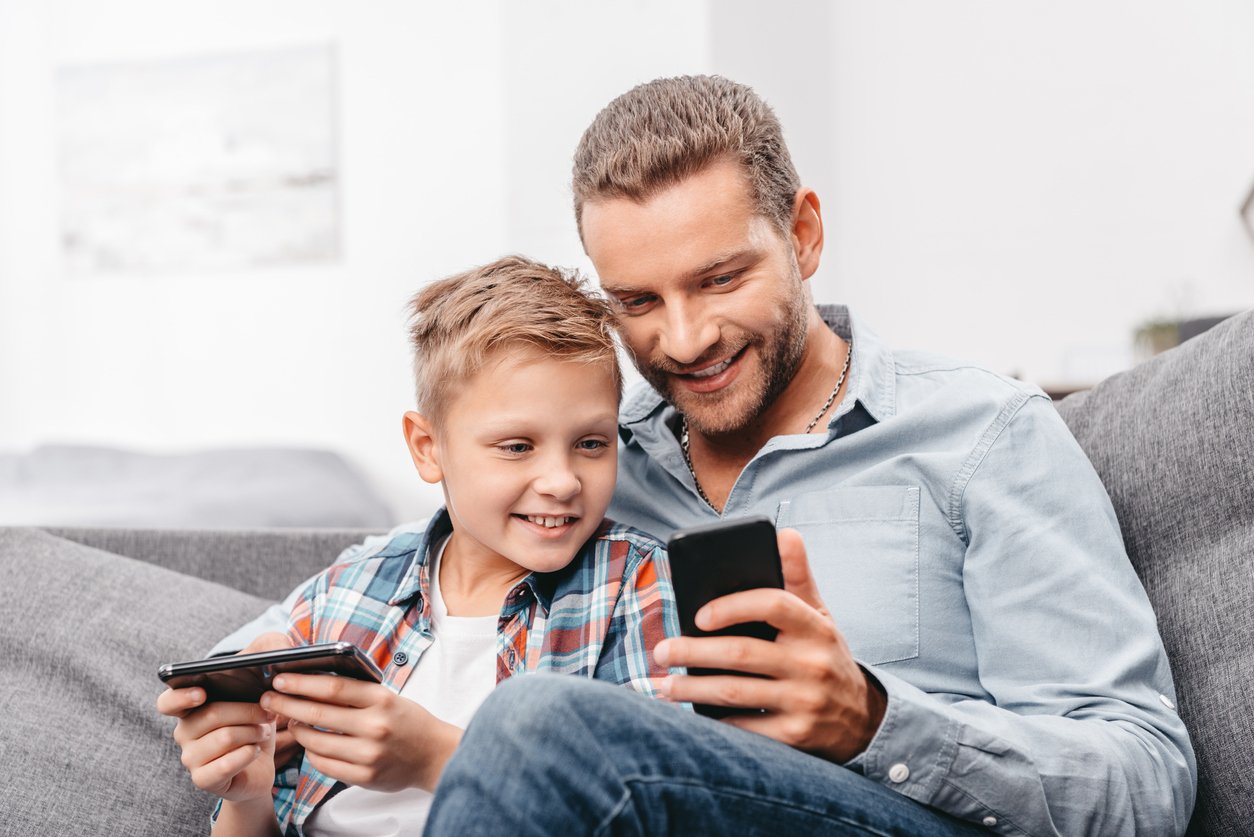 Father and son on phone