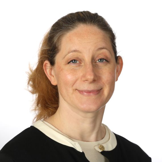 Headshot of Dr Rebecca Bowers, Clinical Director, smiling against a white background