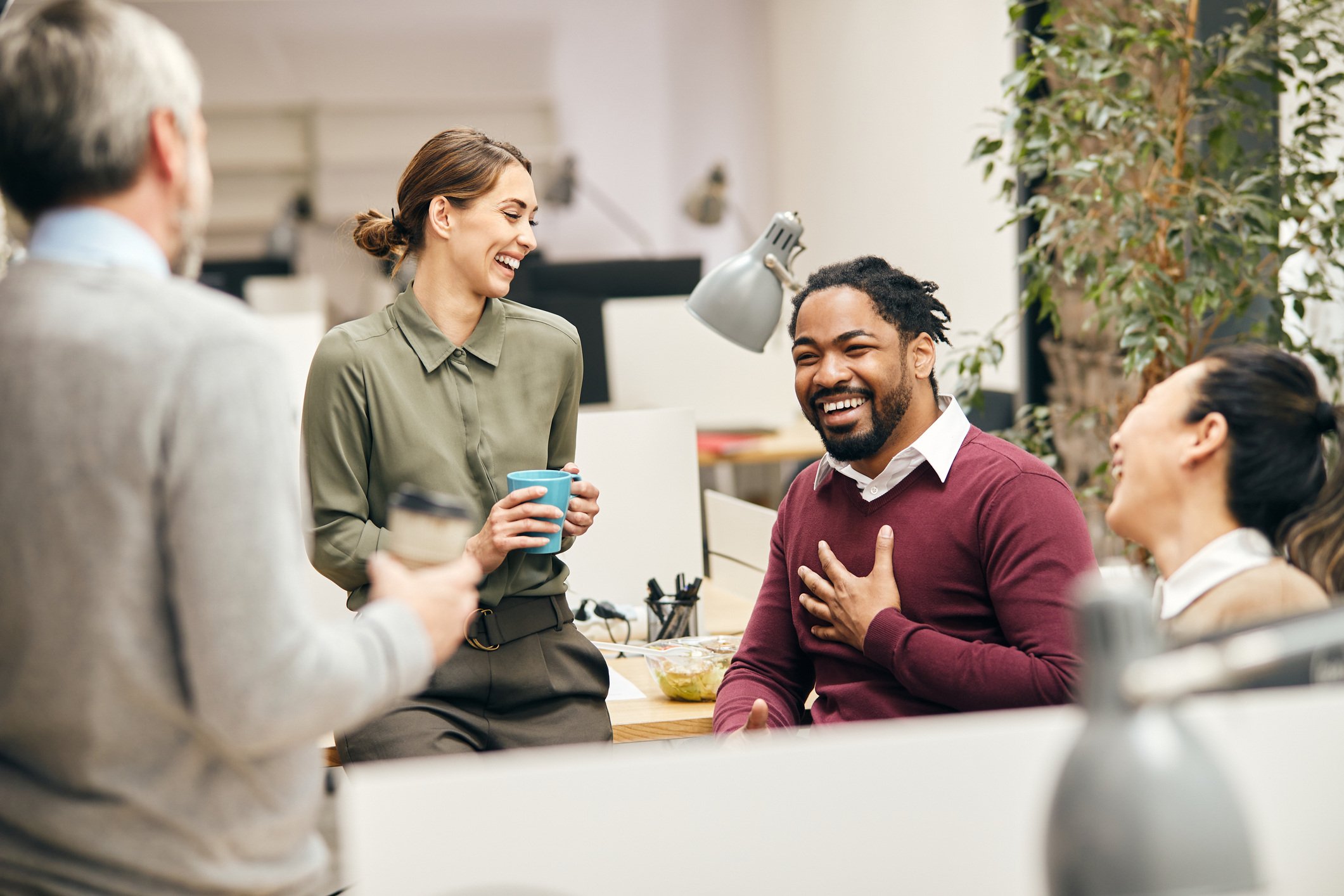 People chatting in office environment