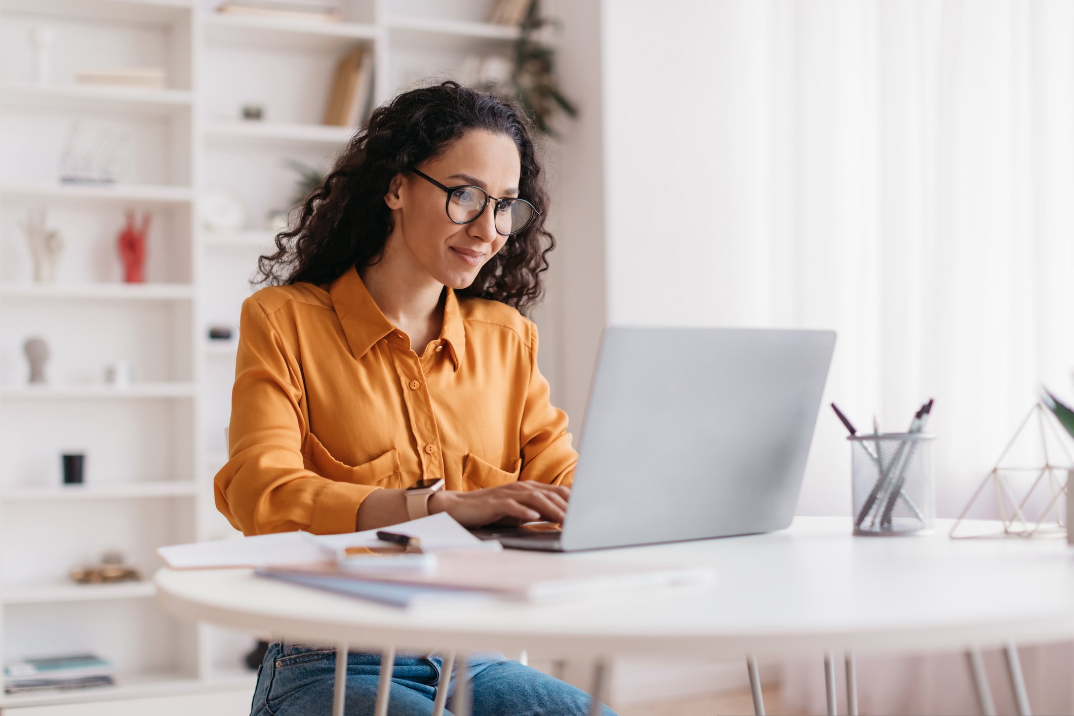 Portrait of a person on a laptop