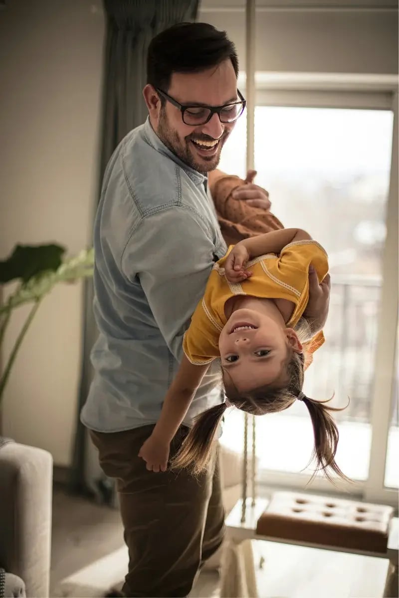 dad-playing-with-daughter