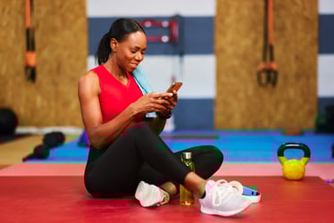 People in office talking in front of desk