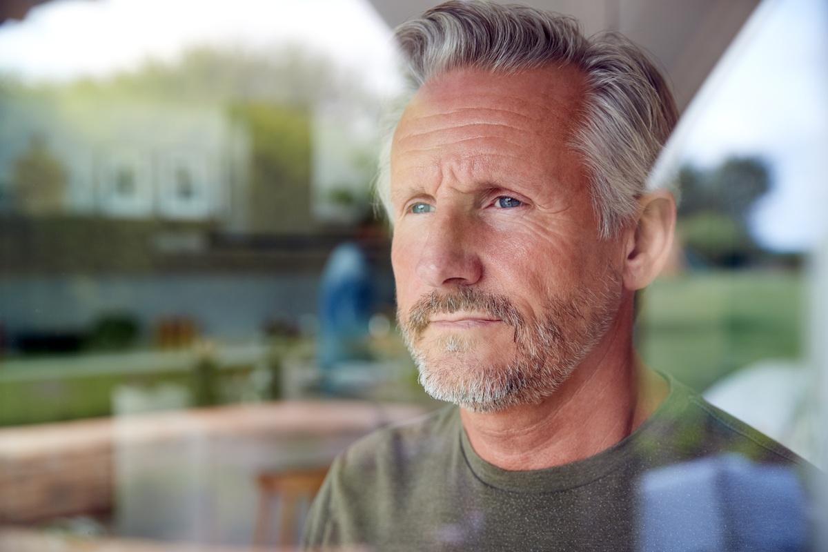 man-window-thoughtful-1200px
