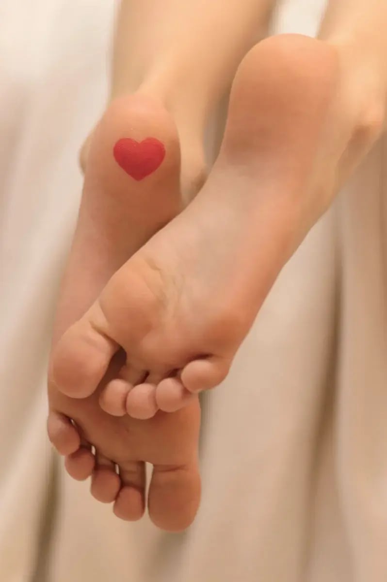 feet-soles-heart-on-heel