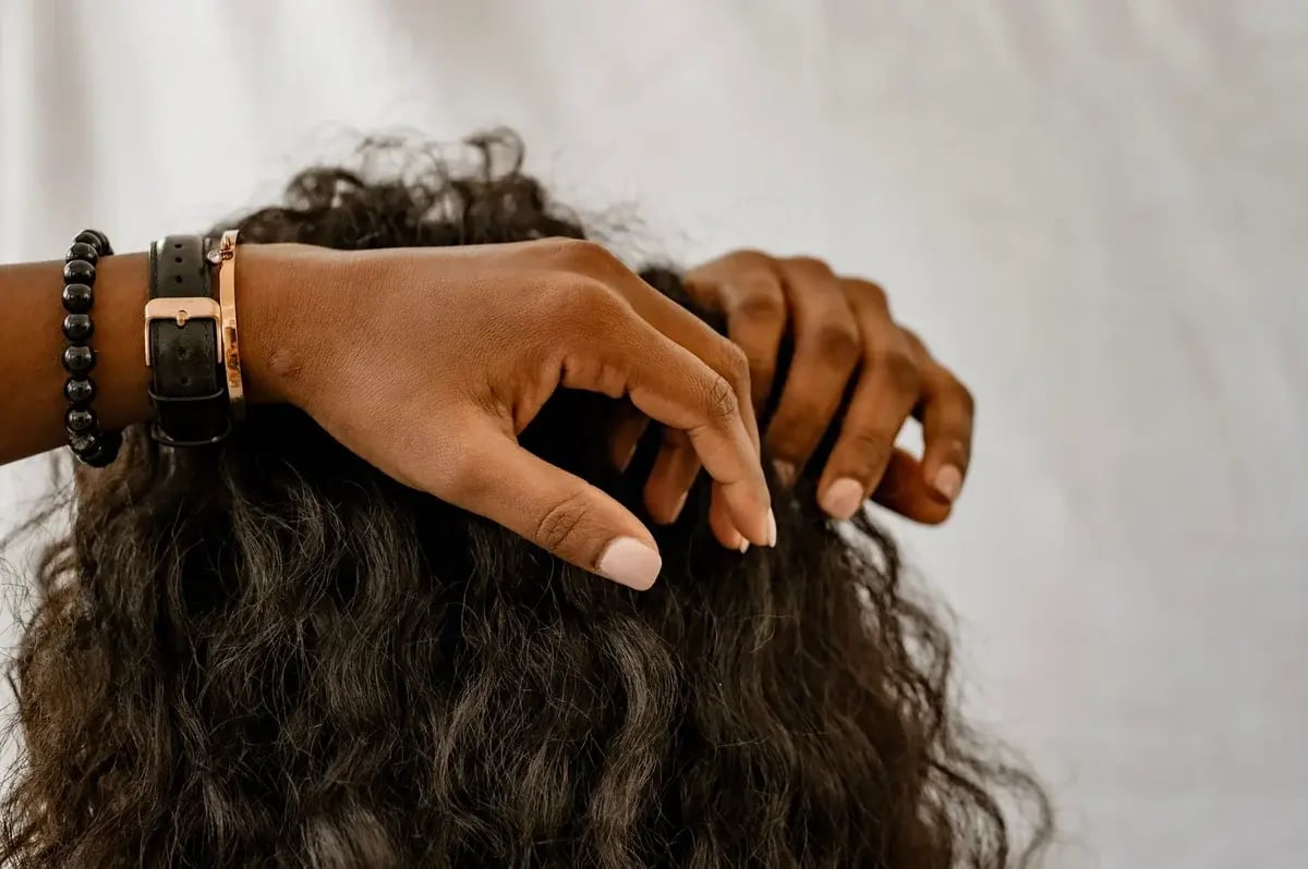 hands-in-curly-hair-scalp